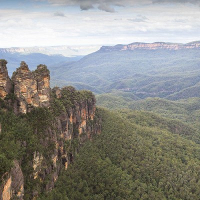 a canyon with a mountain in the background
