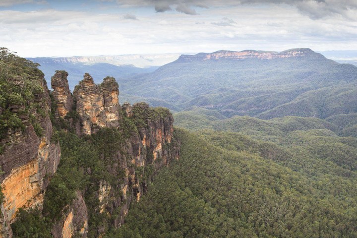 a canyon with a mountain in the background