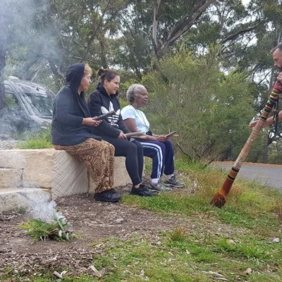 a man sitting in a park