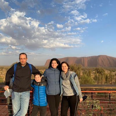 Lior Handelsman et al. standing in front of a mountain